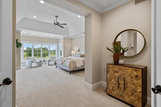 Elegant design and ample space define this stunning second primary suite on the upper level.