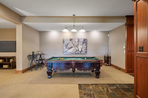 Enjoy the expansive lower level, perfect for games and gatherings.