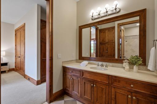 Private ensuite bathroom connected to this lower level bedroom.