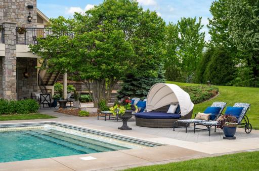 With a variety of comfortable seating options, the pool deck is perfect for both sunbathing and relaxing in the shade.