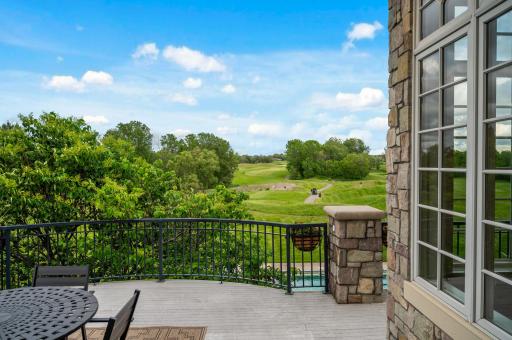This expansive upper deck offers an exceptional outdoor living space with stunning panoramic views.