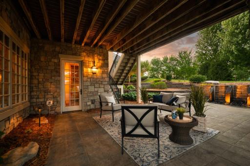 This covered patio offers the perfect spot to unwind and enjoy the peaceful evenings.
