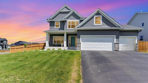 Beautiful curb appeal on this spacious "Eastridge" 2 story floorplan which has the 4th bedroom above the garage which makes all the upstairs bedrooms larger.