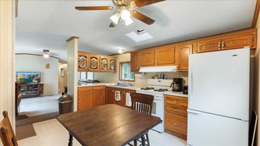 The eat-in kitchen makes for a cozy dining space.