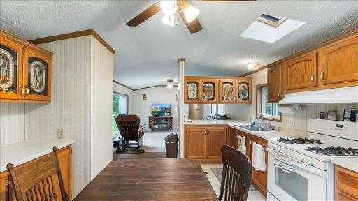 The eat-in kitchen makes for a cozy dining space.