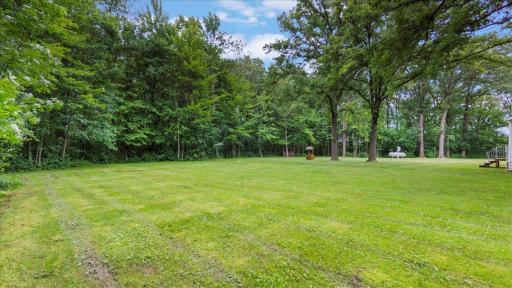 This property offers plenty of wooded space to explore.