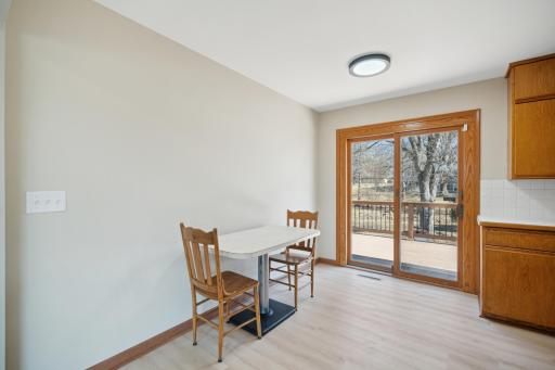 Eat in kitchen with walk out to the composite deck overlooking the large back yard