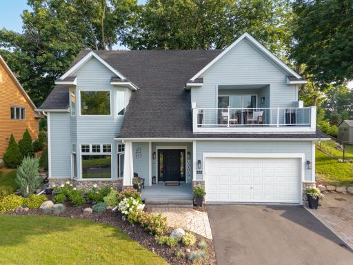 Welcome to this incredible home where you will enjoy the stylish & updated interior filled with a multitude of smart-home features + amazing panoramic lake views of Phelps Bay all year round!