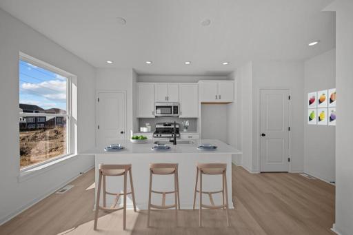 A beautiful kitchen with much natural light!