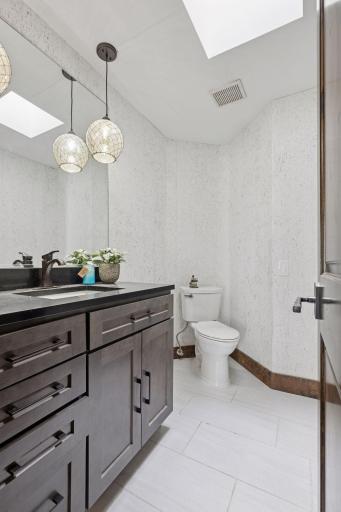 Main floor powder bath is just off the entry.