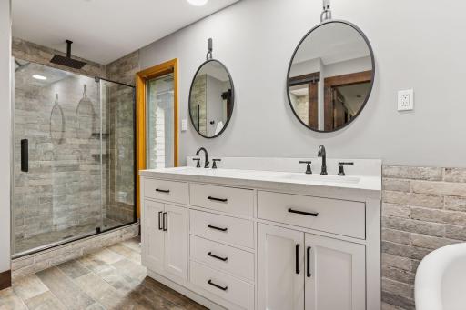 Double sinks in main-floor primary ensuite bathroom