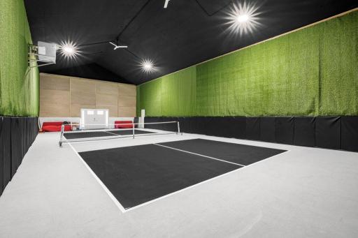 Sport court with double doors...overhead door could easily be added turning this into a 9 care garage!!!