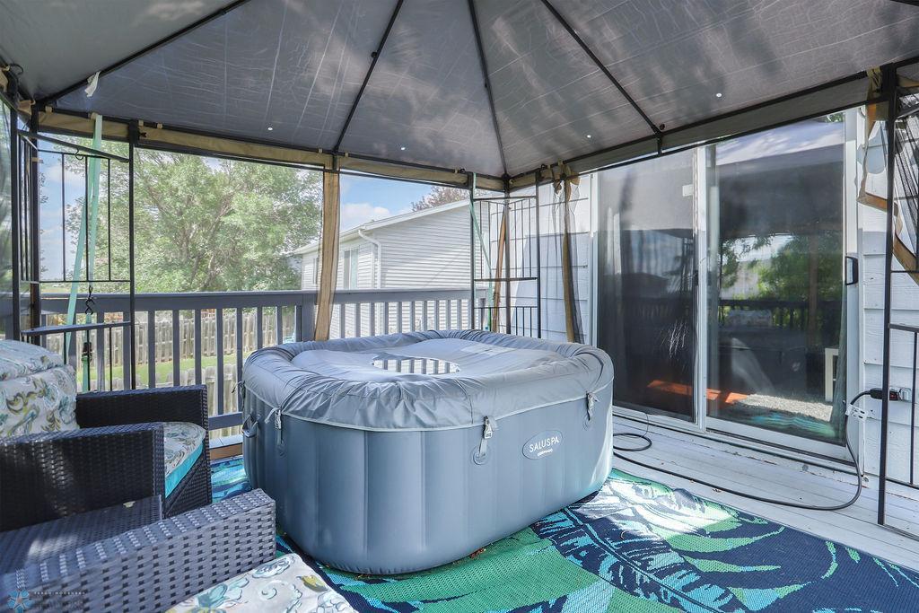 Screened pergola included, hot tub excluded