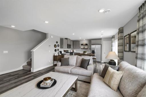 Welcome home to the Duet by D.R. Horton! Complete open concept main floor for all your entertaining needs! (Model photo, colors may vary)