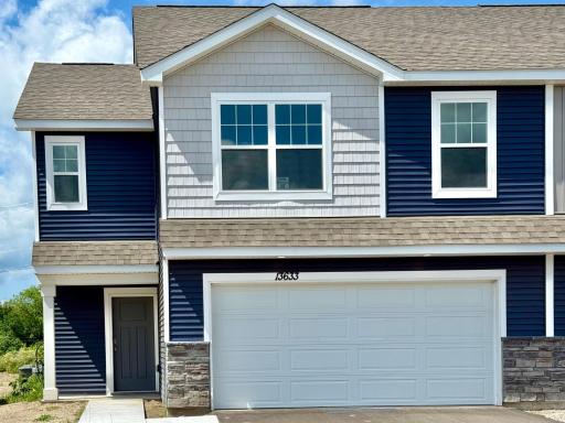 Welcome to the Duet by D.R. Horton! Photo is of actual home, landscaping & sod are included and will be installed as soon as weather permits.