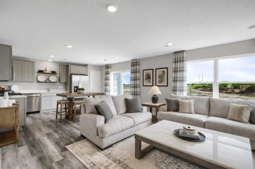 Welcome home to the Duet by D.R. Horton! Complete open concept main floor for all your entertaining needs! (Model photo, colors may vary)
