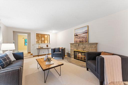 The fireplace is enhanced in the photos, but has not been used in over 10 years; please consider the fireplace a bonus for the warmth of candles or a future gas insert.