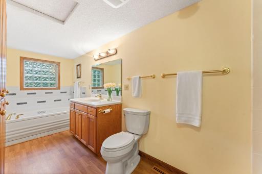 Relax after a long day in your en suite Jacuzzi tub.