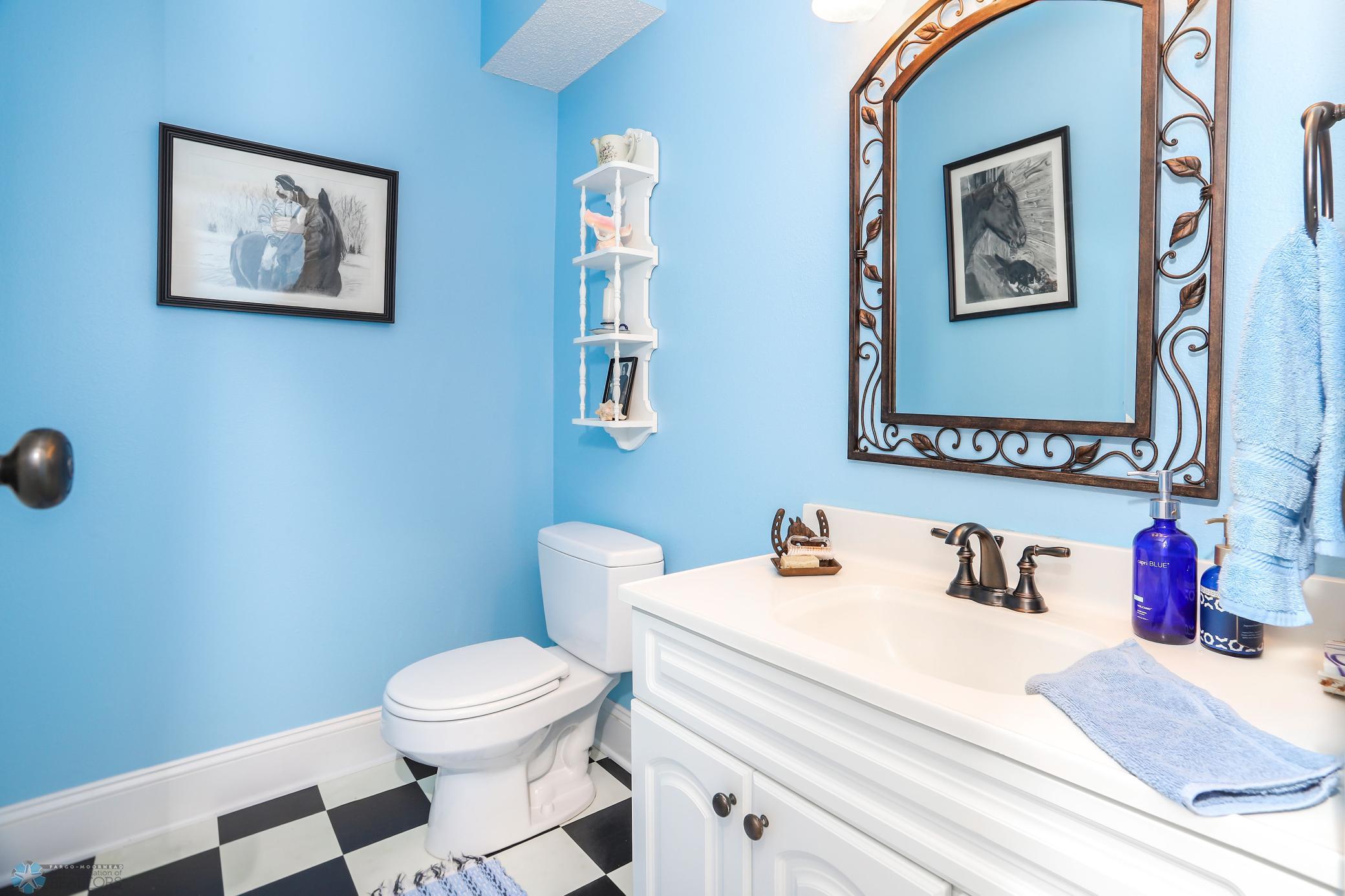 Main Floor powder room, off kitchen