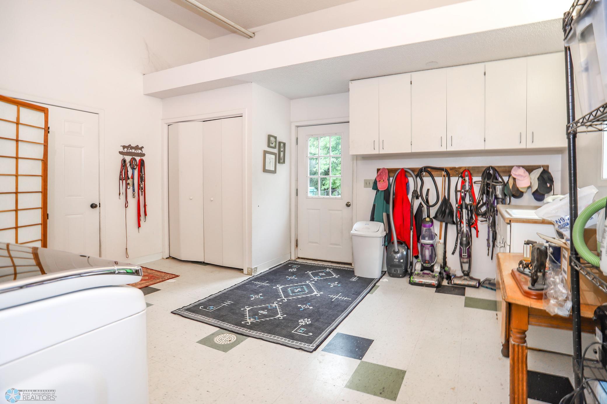 Lower level mud room with extra lg washing machine