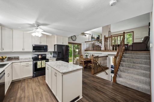 Open kitchen to dining room on this spacious four level home.