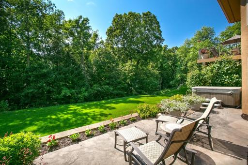 Lush professional landscaping offering a true retreat-like setting.