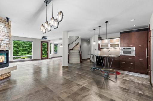 Lower-level features heated flooring for comfort in all seasons.