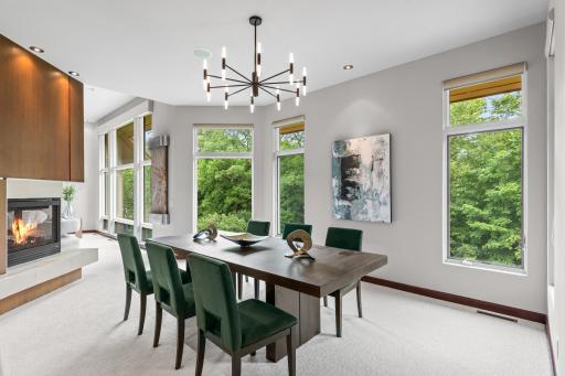 Formal dining area centered by beautiful lightening fixtures