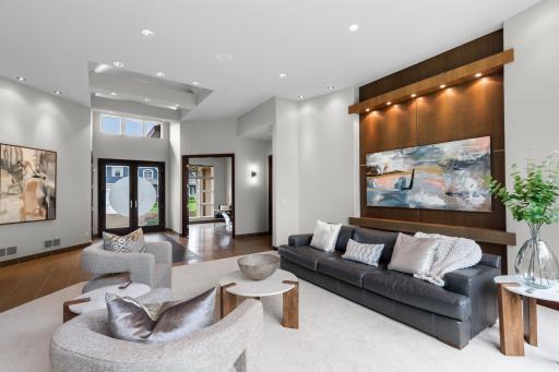 Open floor plan featuring soaring ceilings and custom cabinetry.