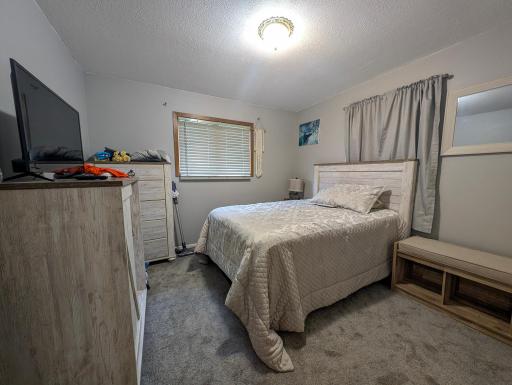 Second bedroom with plenty of space for guests, kids, or a home office. Versatile and ready for your personal touch.