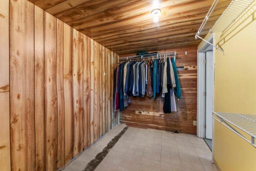 There’s no shortage of storage here either, with a spacious 12x7 cedar closet, a 3x3 under-stair closet, plus a laundry area with a Maytag washer/dryer and a convenient double utility sink.