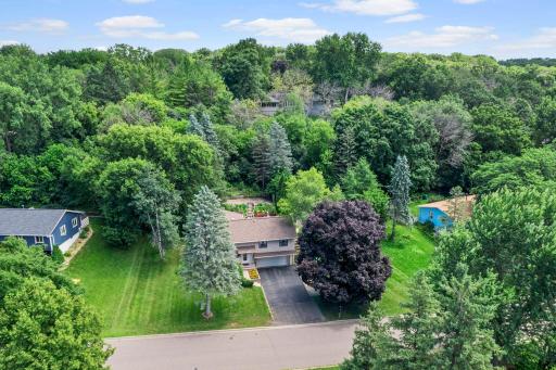 Located in the highly sought-after Minnetonka School District, this home offers the perfect balance of nature and convenience.