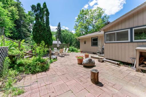Outdoors, you’ll find lovely front patio spaces to enjoy the peaceful surroundings, plus a beautifully landscaped backyard.