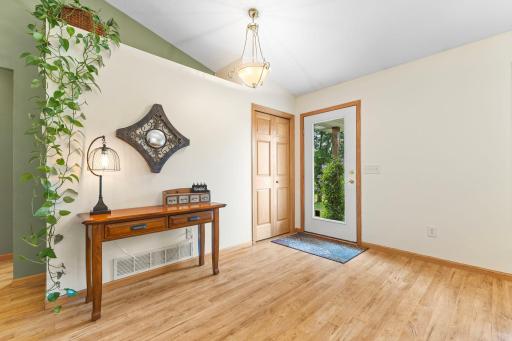 Warm and welcoming entryway with inviting charm and natural light.