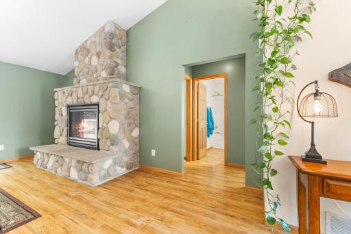 Entry to additional main-floor bedrooms and a full bathroom.
