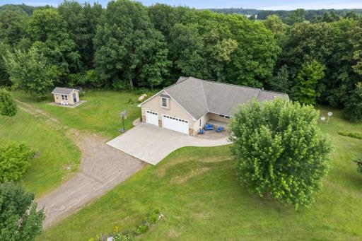 Stunning aerial view showcasing the home's beautiful faÃ§ade and spacious setting.