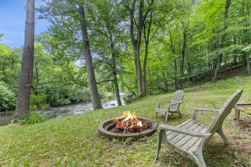 Peaceful riverfront views right from your backyard â nature at its best.
