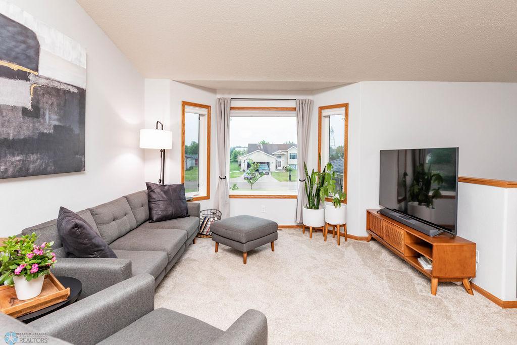 Living Room w/ large bay window