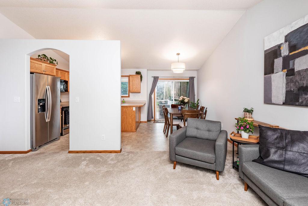 Living Room w/ views to dining & kitchen