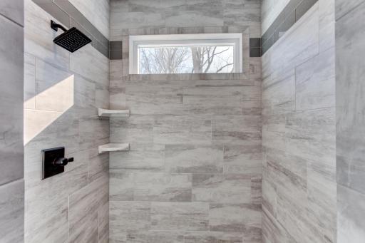 Photos are of a previously completed home with similar design and features. Actual selections, finishes, and materials may vary based on buyer choices and availability.