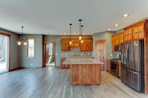 Photos are of a previously completed home with similar design and features. Actual selections, finishes, and materials may vary based on buyer choices and availability.