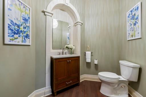 Powder room just off the study on the main level