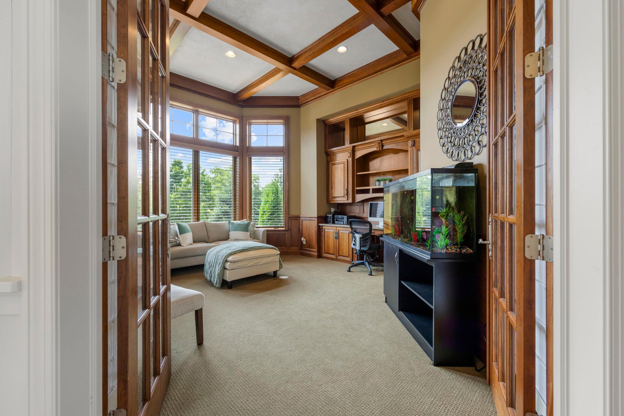 Main floor study with gorgeous built-ins