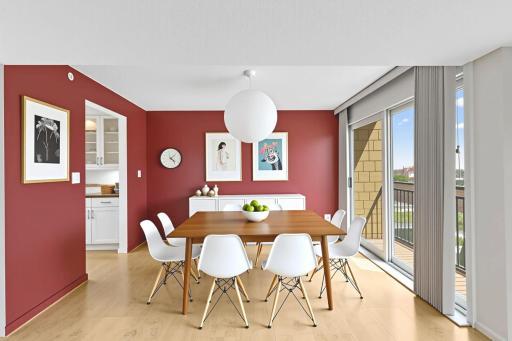 Welcome to 1225 LaSalle #1508. Open dining area just off the kitchen with a sweet Juliet balcony. This dining room has been designed using virtual staging.