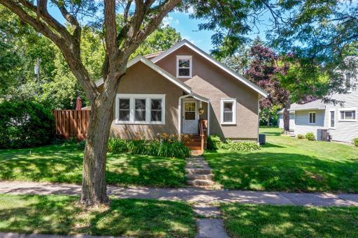 Welcome to this charming one-and-a-half-story home nestled in a quiet, well-established neighborhood, where timeless character meets everyday comfort.