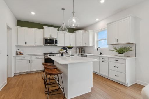 (Photo of a decorated model home, actual features may vary) Open concept kitchen!