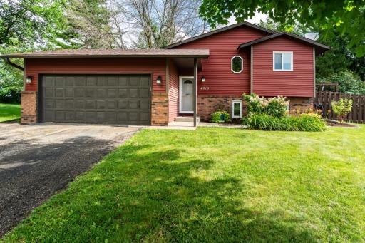 This clean, modern-styled home features 4 bedrooms and 2 bathrooms, and is tucked onto a fully-fenced, mature-treed, CUL DE SAC lot just steps from Sand Pointe Beach!