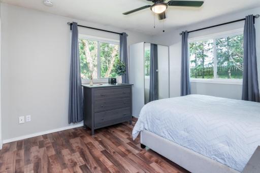 This is one of two upper level bedrooms - both have double sets of windows!