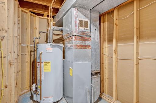Utility room om the lower level has extra bonus storage space.