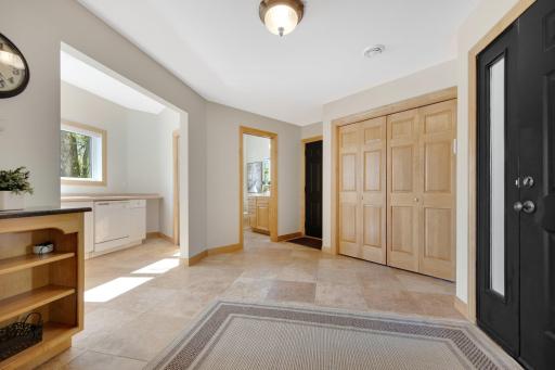 Speaking of Entertaining, a large mud room complete with tile floors awaits your guests giving them space to enter.